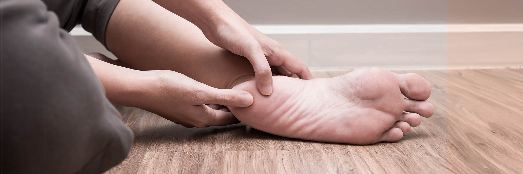 What causes heel spurs and how are they treated?