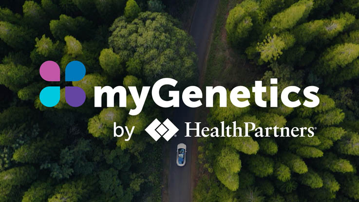 A bird's eye view of a car driving on a single-lane road through a forest. The myGenetics by HealthPartners logo is over the top of the image.